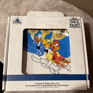 Disney ink and paint set of four plates